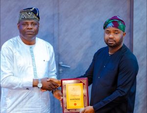 L-R: Bimbo Kolade, RMAFC's Inland Revenue Monitoring Committee (IRMC), member being presented with a certificate by the FIRS Executive Chairman, Dr. Zaach Adedeji during the inauguration of a joint FIRS-RMAFC Technical Committee at the FIRS headquarters, Thursday in Abuja,