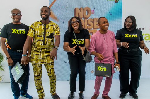 –R: Echezona Ezeuko, Regional Sales Manager, Festac Region, Access Bank PLC; Emmanuel Augustine, Winner, DiamondXtra Promo; Adaeze Ume, Unit Head, Consumer Banking, Access Bank PLC; Pastor Alex Onyeamachi Nwachukwu, Winner, DiamondXtra Promo; and Olukemi Olayinka, Regional Sales Director, Lagos 3 Directorate, Access Bank PLC — during the launch of DiamondXtra Season 17 in Alaba, Lagos.
