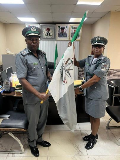 L-R : Comptroller Olu Adebisi handing over to Comptroller Victoria Chinwe Aliboh at the FCT Customs Command