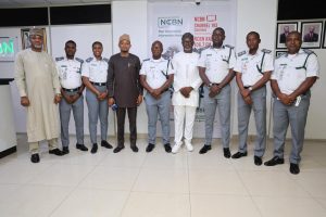 National Public Relations Officer of the Nigeria Customs Service, Assistant Comptroller of Customs Abdullahi Maiwada alongside officers from the Public Relations Unit pose for picture with renowned artificial intelligence strategist and digital consultant Celestine Achi, author of "AI-Powered PR: The Essential Guide for Communications Leaders to Master Artificial Intelligence,"