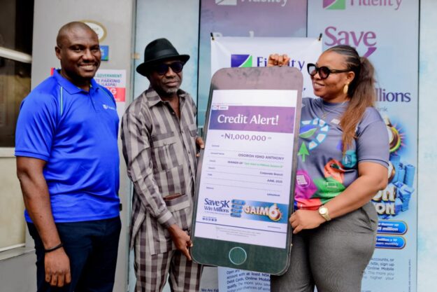 L – R: SME Cordinator, Victoria Island/ Lekki Region, Fidelity Bank Plc, Stanley Ogbuze; GAIM 6 Seventh Monthly draw Winner, Osoroh Igho Anthony; and Retail sales Co-ordinator, Victoria Island/ Lekki Region, Fidelity Bank Plc, Ruth Edobor; at a GAIM 6 prize presentation ceremony held at Fidelity Bank, Saka Tinubu Street, Victoria Island, Lagos recently