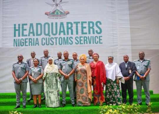 CGC of Customs, Bashir Adewale Adeniyi flanked by Director General of NAPTIP, Binta Adamu (L) and a former Director in NIMASA, Hajia Lami Tumska (R), joined by some senior Customs officers and other delegates from NAPTIP