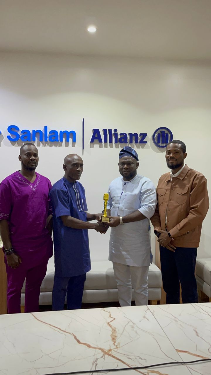 L-R: Marketing and Corporate Communications Manager, SanlamAllianz Nigeria, Mr. Bankole Banjo; FIBOP President, Mr. Charles Onwuatogwu; Chief Operating Officer, SanlamAllianz Nigeria, Adeola Adekunle and Group Head, Strategy, Marketing and Customer Relations, SanlamAllianz Nigeria, Mr. Chris Ekwonwa, during the presentation of Award to SanlamAllianz in Lagos on Friday, November 7, 2025.