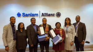 L-R: Chris Ekwonwa, Group Head, Strategy, Marketing and Customer Relations; Abimbola Lawson, Head, Legal and Compliance; Tunde Mimiko, MD/CEO, all of SanlamAllianz Nigeria; Destiny Onyemihia and Blessing Enebeli, both of Voice of Nigeria; Juliet Ajiboye, Head, Technical; and Bankole Banjo, Marketing and Corporate Communications Manager, SanlamAllianz Nigeria
