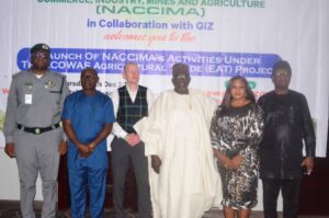 L-rAssistant Controller Of Customs, Osamwonyi Uzamere,President Badagry Chamber, Yahyah Oladiran Idris, Project Leader/ Coordinator Project ECOWAS Agricultural Trade Project (EAT), Arne Schuffenhauer ,President NACCIMA, Engr. Jani Ibrahim, Director General NACCIMA, Olushola Obadimu, at the  Launch of NACCIMA's Activities under the ECOWAS Agricultural Trade (EAT) Project. Held at Radisson Hotel, Isaac John, Ikeja GRA, Lagos. On 4th December 2025.