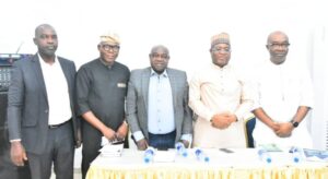 From left, Chairman, Capital Market Correspondents Association of Nigeria (CAMCAN), Mr Friday Ekeoba; MD, GTI Capital, Hassan Kehinde; Mr Emmanuel Etaderhi, Divisional Head, Government Affairs, FMDQ; Chairman, Nigerian Exchange Group, Alh(Dr) Umaru Kwairanga and John Briggs, Head, Lagos Zonal Office, Securities and Exchange Commission (SEC) at the 2025 Annual Conference of CAMCAN in Lagos on Saturday, in Lagos.