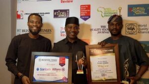 L-R: Chris Ekwonwa, Group Head Strategy, Marketing and Customer Relations; Tunde Mimiko, MD/CEO and Bankole Banjo, Marketing and Corporate Communications Manager all of SanlamAllianz Nigeria pose with the awards.