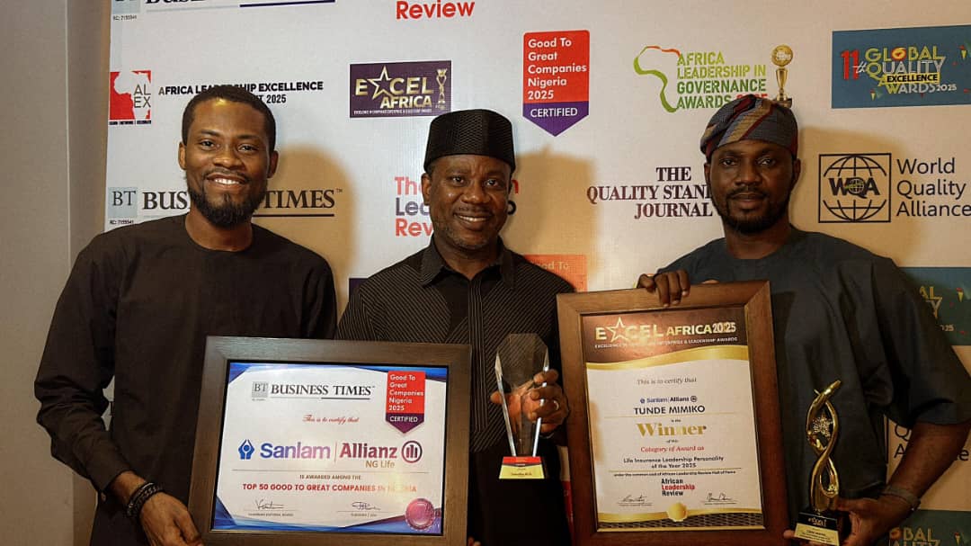 L-R: Chris Ekwonwa, Group Head Strategy, Marketing and Customer Relations; Tunde Mimiko, MD/CEO and Bankole Banjo, Marketing and Corporate Communications Manager all of SanlamAllianz Nigeria pose with the awards.