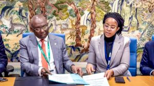 Director General, Nigerian Maritime Administration and Safety Agency, NIMASA, Dr Dayo Mobereola (left) and Alternate Permanent Representative of Tanzania’s Mission to International Maritime Organisation, Dr. Devotha Edward Mandanda during the signing of a Memorandum of Understanding between NIMASA and TASAC in London. 