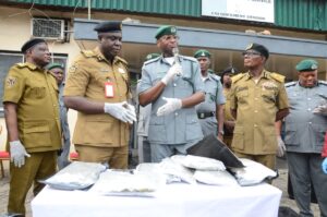 Comptroller Frank Onyeka (M) flanked by NDLEA Officials during the press briefing to announce the seizure of of 1×40ft container of Cannabis Indica on Wednesday 5th Feb. 2026