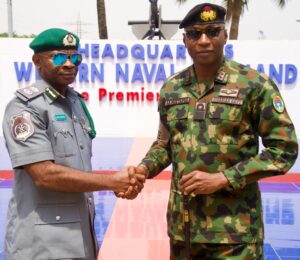L-R: CAC, Apapa Area Command, Comptroller Emmanuel Oshoba in a warm handshake with Flag Officer Commanding (FOC), Western Naval Command, Rear Admiral Abubakar Abdullahi Mustapha, during a courtesy visit to the Naval Chief on Wednesday, 25. February 2026,