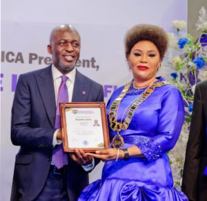L–R: Kayode Lawal, Managing Director/CEO, Polaris Bank, receives the Professional Fellowship certificate from Dr. Markie Idowu, President of the Nigerian Institute of Credit Administration (NICA), during the Institute’s investiture ceremony.