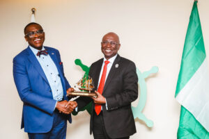 Director General, Nigerian Maritime Administration and Safety Agency, NIMASA; Dr. Dayo Mobereola (Right); making a presentation to the Honorary Consul of the Republic of Liberia in Lagos, Mr. Dapo Akinosun, SAN; when the Honorary Consul paid a visit to the NIMASA headquarters in Lagos.