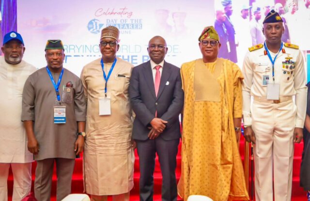 L-R: President-General, Maritime Workers Union of Nigeria (MWUN); Comrade Francis Bunu, Deputy Chairman of the Nigerian House of Representatives Committee on Maritime Safety, Education and Administration, Hon. Uduak Odudoh; Director, Maritime safety and security, Federal Ministry of Marine and Blue Economy, Mr Makoji Musa; representing the Honorable Minister, Director General, Nigerian Maritime Administration and Safety Agency, NIMASA, Dr Dayo Mobereola; Chairman, Senate Committee on Marine Transport; Senator Wasiu Eshinlokun Sanni; Flag Officer Commanding, Western Naval Command Rear Admiral Abdullahi Mustapha representing the Chief of Naval staff during the celebration of 2026 Day of the Seafarers in Lagos, Nigeria.