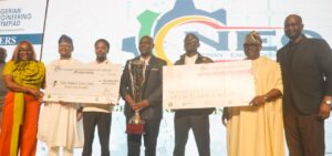 (L-R): Alexis Emelle, General Manager, Human Capital Development, Nigerian Content Development & Monitoring Board (NCDMB); Silas Omomehin Ajimijaye, Director, Planning Research & Statistics (NCDMB); Smart Sharon; Dr David Patrick; Abel Philip, winner of Nigerian Engineering Olympiad (NEO) from Modibbo Adama University of Technology, Adamawa State; Engr Abayomi Bamidele, Director, Project Certification and Authorization (NCDMB); and Engr Michael Ajayi, Country Director, Enactus Nigeria at the 2026 Nigerian Engineering Olympiad (NEO) Competition Grand Finale held in Lagos on 30th of June 2026 at Eko Hotel Victoria Island Lagos