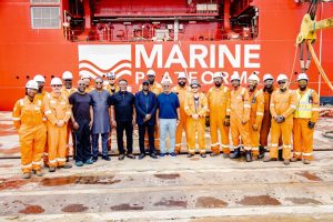 DG/CEO NIMASA; Dr Dayo Mobereola  (middle) in a group photograph with seafarers on board the African Pioneer Lagos vessel.